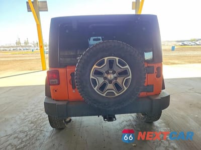 Zdjęcie 6 z 13 samochodu: 2013 JEEP WRANGLER UNLIMITED RUBICON VIN:1C4BJWFG1DL560692 - miniatura