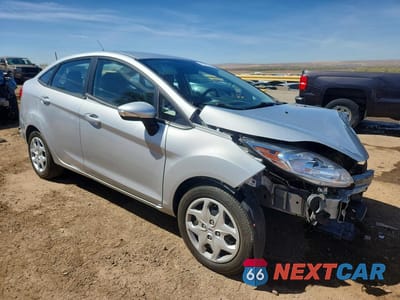 Czwarte zdjęcie samochodu z boku: 2013 FORD FIESTA SE VIN:3FADP4BJ7DM172447 - miniatura