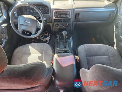 Zdjęcie 8 z 13 samochodu: 2001 JEEP GRAND CHEROKEE LAREDO VIN:1J4GW48S11C700338 - miniatura