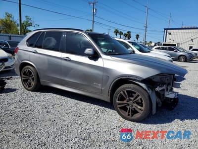 Czwarte zdjęcie samochodu z boku: 2015 BMW X5 SDRIVE35I VIN:5UXKR2C50F0H39610 - miniatura