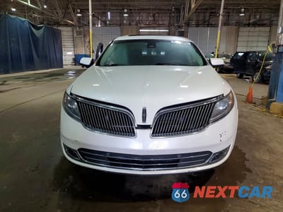 Czwarte zdjęcie samochodu z boku: 2013 LINCOLN MKS VIN:1LNHL9EK6DG614892 - miniatura