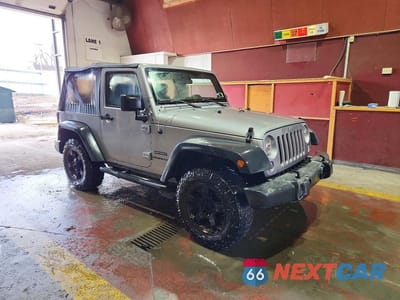 Czwarte zdjęcie samochodu z boku: 2016 JEEP WRANGLER SPORT VIN:1C4AJWAG1GL181831 - miniatura
