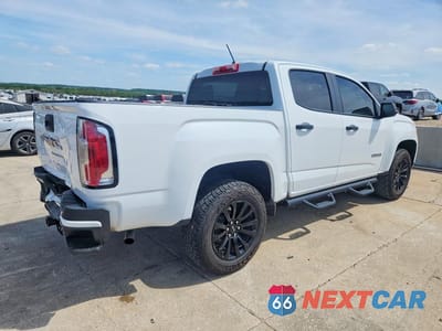 Trzecie zdjęcie samochodu z tyłu: 2021 GMC CANYON ELEVATION VIN:1GTG5BEA4M1278090 - miniatura