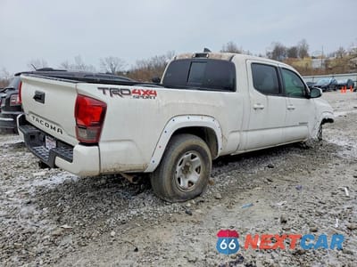 Trzecie zdjęcie samochodu z tyłu: 2017 TOYOTA TACOMA TRD SPORT VIN:3TMDZ5BN9HM013030 - miniatura