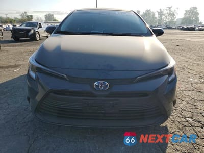 Piąte zdjęcie samochodu w środku: 2025 TOYOTA COROLLA HYBRID LE VIN:JTDBCMFE1S3087676 - miniatura