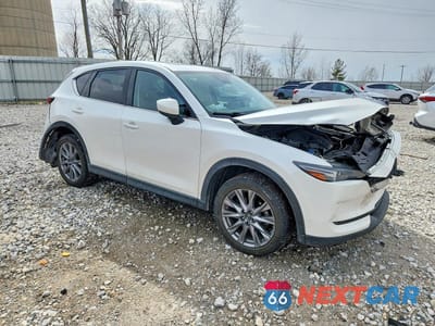 Czwarte zdjęcie samochodu z boku: 2021 MAZDA CX-5 GRAND TOURING RESERVE VIN:JM3KFBAY2M0397909 - miniatura