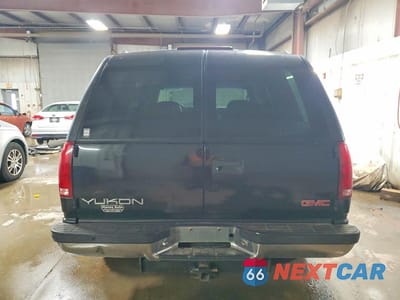Zdjęcie 6 z 12 samochodu: 1999 GMC YUKON VIN:1GKEC13R9XJ793112 - miniatura