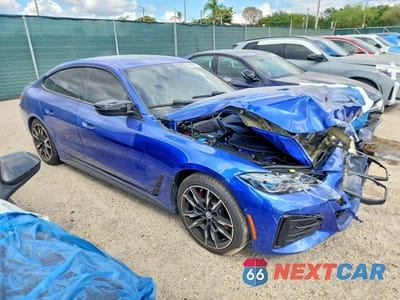 Czwarte zdjęcie samochodu z boku: 2023 BMW I4 M50 VIN:WBY33AW07PFP05899 - miniatura