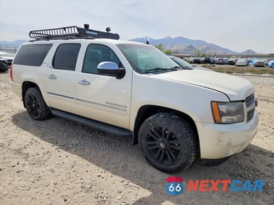 Czwarte zdjęcie samochodu z boku: 2009 CHEVROLET SUBURBAN K1500 LTZ VIN:1GNFK36359R300401 - miniatura