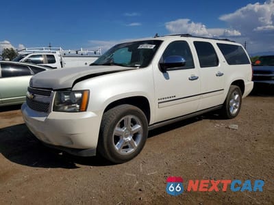 2011 CHEVROLET SUBURBAN C1500 LTZ 1GNSCKE04BR125612 - główne zdjęcie licytacji z USA - miniatura