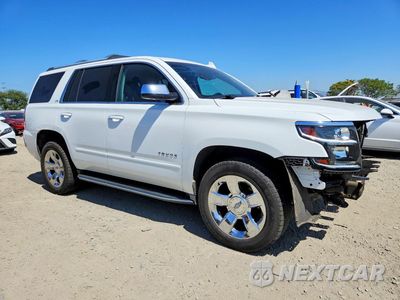 Czwarte zdjęcie samochodu z boku: 2015 CHEVROLET TAHOE C1500 LTZ VIN:1GNSCCKC6FR565602 - miniatura