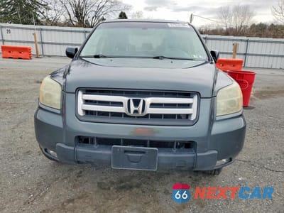 Piąte zdjęcie samochodu w środku: 2006 HONDA PILOT EX VIN:5FNYF18666B002717 - miniatura