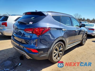 Trzecie zdjęcie samochodu z tyłu: 2018 HYUNDAI SANTA FE SPORT 2.0T ULTIMATE VIN:5XYZWDLA5JG523169 - miniatura