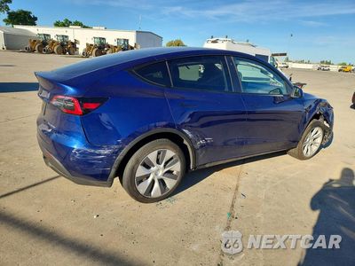 Trzecie zdjęcie samochodu z tyłu: 2023 TESLA MODEL Y VIN:7SAYGDEE2PF704306 - miniatura
