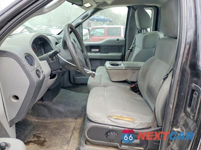 Zdjęcie 7 z 12 samochodu: 2007 FORD F150 VIN:1FTRF12247NA25023 - miniatura
