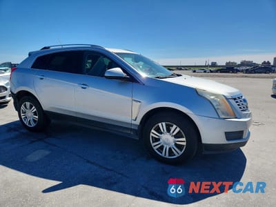 Czwarte zdjęcie samochodu z boku: 2014 CADILLAC SRX LUXURY COLLECTION VIN:3GYFNBE37ES652893 - miniatura