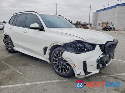 Czwarte zdjęcie samochodu z boku: 2025 BMW X5 XDRIVE50E VIN:5UX43EU01S9Y60695 - miniatura