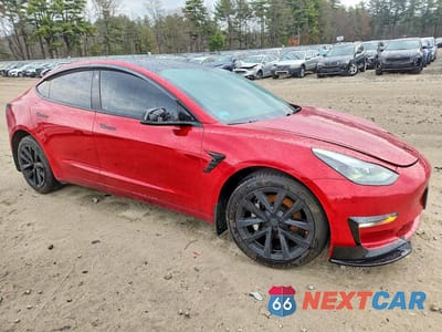 Czwarte zdjęcie samochodu z boku: 2022 TESLA MODEL 3 VIN:5YJ3E1EB6NF233582 - miniatura