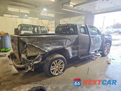 Trzecie zdjęcie samochodu z tyłu: 2016 GMC CANYON SLT VIN:1GTH6DE30G1382966 - miniatura