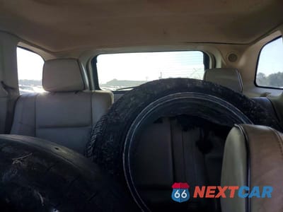 Zdjęcie 10 z 13 samochodu: 2013 JEEP GRAND CHEROKEE OVERLAND VIN:1C4RJECG9DC526108 - miniatura