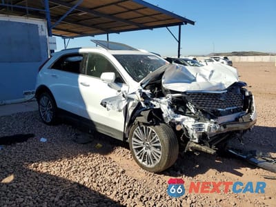 Czwarte zdjęcie samochodu z boku: 2024 CADILLAC XT4 PREMIUM LUXURY VIN:1GYFZDR42RF123204 - miniatura