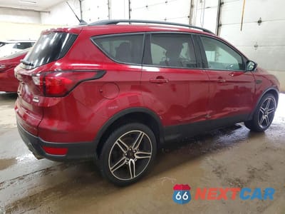 Trzecie zdjęcie samochodu z tyłu: 2019 FORD ESCAPE SEL VIN:1FMCU0HD1KUA96379 - miniatura