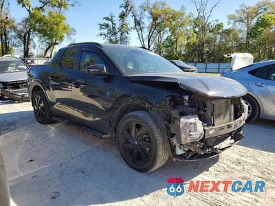 Czwarte zdjęcie samochodu z boku: 2023 HYUNDAI SANTA CRUZ NIGHT VIN:5NTJCDAF2PH040147 - miniatura