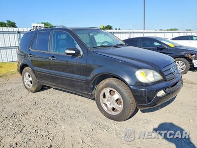 Czwarte zdjęcie samochodu z boku: 2003 MERZ 300-CLASS VIN:4JGAB57E54A513303 - miniatura