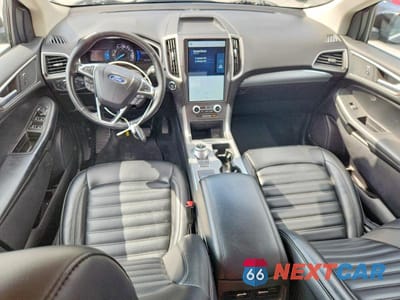 Zdjęcie 8 z 12 samochodu: 2021 FORD EDGE SEL VIN:2FMPK3J96MBA26397 - miniatura