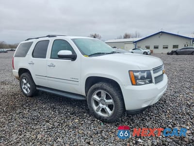 Czwarte zdjęcie samochodu z boku: 2012 CHEVROLET TAHOE K1500 LTZ VIN:1GNSKCE05CR234218 - miniatura