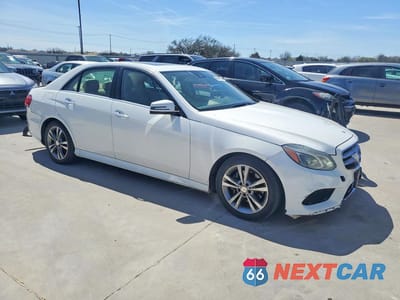 Czwarte zdjęcie samochodu z boku: 2014 MERCEDES-BENZ E 250 BLUETEC VIN:WDDHF0EB6EA879197 - miniatura