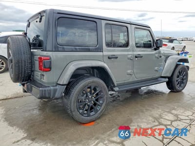 Trzecie zdjęcie samochodu z tyłu: 2022 JEEP WRANGLER UNLIMITED SAHARA 4XE VIN:1C4JJXP69NW205308 - miniatura