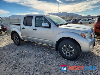 Czwarte zdjęcie samochodu z boku: 2018 NISSAN FRONTIER PRO-4X VIN:1N6AD0EV4JN708363 - miniatura