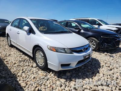 Czwarte zdjęcie samochodu z boku: 2011 HONDA CIVIC HYBRID VIN:JHMFA3F28BS000402 - miniatura