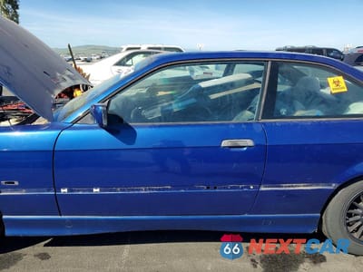 Zdjęcie 7 z 11 samochodu: 1999 BMW 323 IS VIN:WBABF7335XEH44289 - miniatura