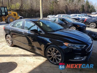 Czwarte zdjęcie samochodu z boku: 2017 FORD FUSION TITANIUM VIN:3FA6P0D96HR219691 - miniatura