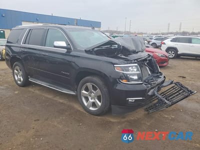 Czwarte zdjęcie samochodu z boku: 2015 CHEVROLET TAHOE K1500 LTZ VIN:1GNSKCKC1FR186073 - miniatura