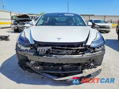 Piąte zdjęcie samochodu w środku: 2021 TESLA MODEL 3 VIN:5YJ3E1EA7MF017049 - miniatura