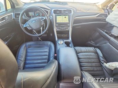 Zdjęcie 8 z 12 samochodu: 2018 FORD FUSION SE HYBRID VIN:3FA6P0LU6JR171637 - miniatura