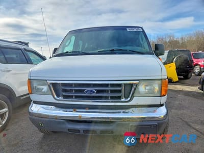 Piąte zdjęcie samochodu w środku: 2004 FORD ECONOLINE E350 SUPER DUTY WAGON VIN:1FBSS31L34HB02174 - miniatura