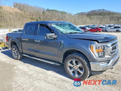 Czwarte zdjęcie samochodu z boku: 2022 FORD F150 SUPERCREW VIN:1FTFW1E89NFB04844 - miniatura