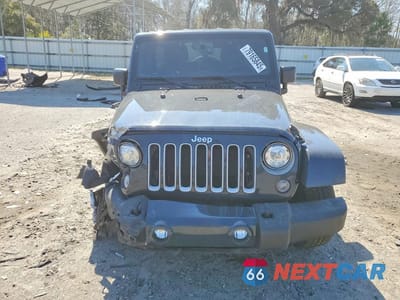 Piąte zdjęcie samochodu w środku: 2017 JEEP WRANGLER UNLIMITED SAHARA VIN:1C4BJWEG1HL700361 - miniatura