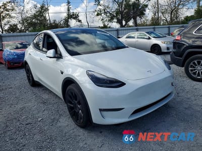 Czwarte zdjęcie samochodu z boku: 2025 TESLA MODEL Y VIN:7SAYGAEE2SF227884 - miniatura