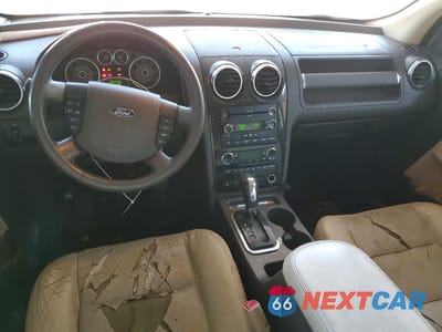 Zdjęcie 8 z 12 samochodu: 2008 FORD TAURUS X SEL VIN:1FMDK05WX8GA43025 - miniatura