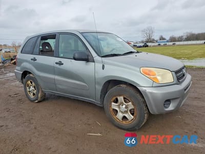 Czwarte zdjęcie samochodu z boku: 2004 TOYOTA RAV4 BASE VIN:JTEGD20V140032564 - miniatura