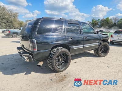 Trzecie zdjęcie samochodu z tyłu: 2003 CHEVROLET TAHOE C1500 VIN:1GNEC13V13R233855 - miniatura