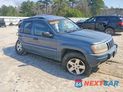 Czwarte zdjęcie samochodu z boku: 2001 JEEP GRAND CHEROKEE LAREDO VIN:1J4GW48S71C662985 - miniatura