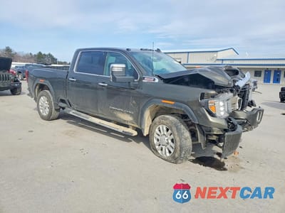 Czwarte zdjęcie samochodu z boku: 2023 GMC SIERRA K3500 DENALI VIN:1GT49WEY5PF219536 - miniatura