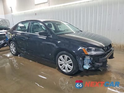 Czwarte zdjęcie samochodu z boku: 2017 VOLKSWAGEN JETTA S VIN:3VW2B7AJ2HM221589 - miniatura