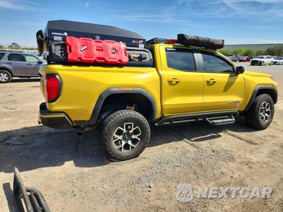 Trzecie zdjęcie samochodu z tyłu: 2023 GMC CANYON AT4X VIN:1GTP6EEK9P1265475 - miniatura